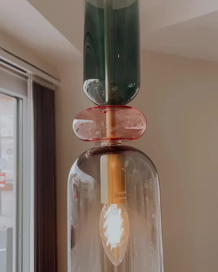 Glass pendant light by the window at mi. cafe & bar